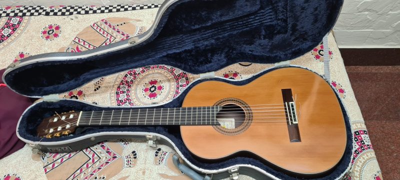 purchased directly from the luthier, made in spain, lattice braced , classical guitar. Cedar top and Indian rosewood back and sides.